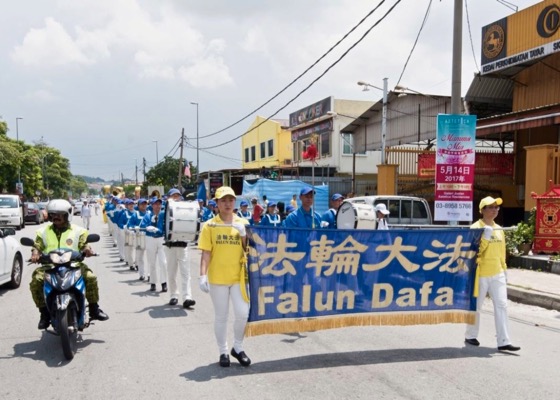 Image for article Practicantes de Falun Gong de Malasia celebran el Día Mundial de Falun Dafa