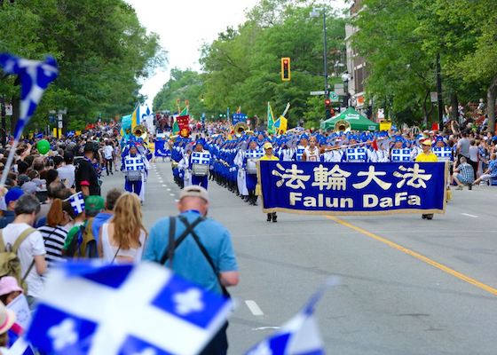 Image for article El Desfile de Falun Dafa se destaca en el desfile del Día Nacional en Quebec