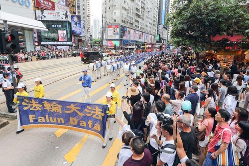 Image for article Hong Kong: Gran desfile y concentración para pedir que se ponga fin a la persecución
