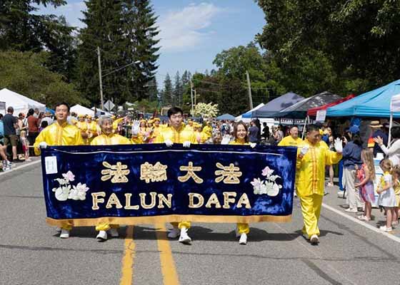 Image for article Seattle: Falun Dafa premiada como mejor entrada general en el desfile de otoño de la ciudad