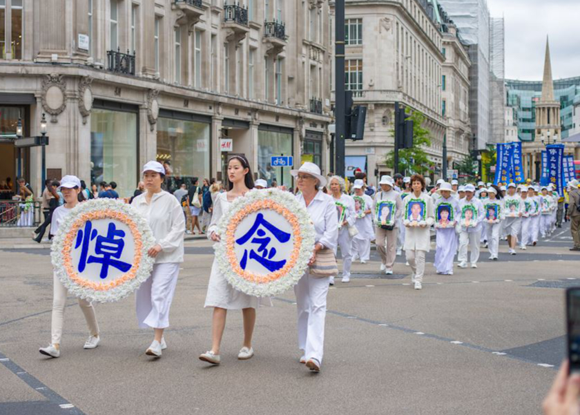 Image for article Reino Unido: los practicantes de Falun Dafa organizan un desfile y una concentración pacífica, y presentan una petición a la Oficina del Primer Ministro