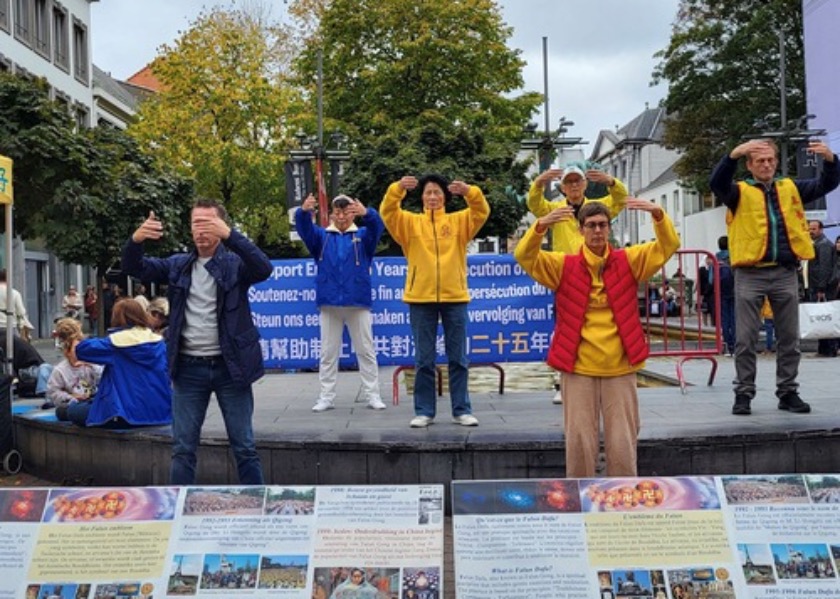 Image for article Amberes, Bélgica: Practicantes de Falun Dafa generan conciencia y obtienen apoyo público