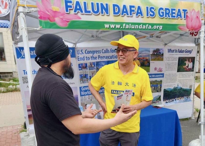 Image for article Michigan, EE. UU.: Presentación de Falun Dafa en la Feria Anual de Arte de Ann Arbor