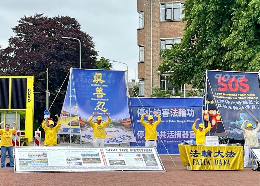 Image for article Practicantes de Falun Gong crean conciencia sobre la persecución durante la cumbre de la OTAN