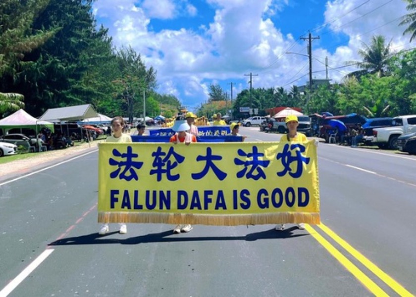 Image for article Saipán, EE. UU.: Practicantes de Falun Dafa participan en el Desfile del Día de la Independencia