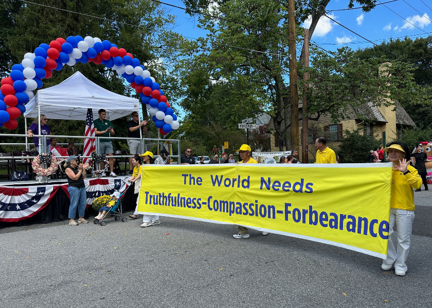 Image for article Maryland, EE. UU.: El público muestra su apoyo a Falun Dafa en las celebraciones del Día del Trabajo