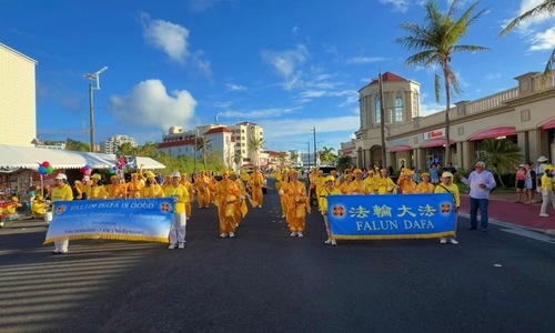 Image for article Practicantes taiwaneses de Falun Dafa visitan Guam para participar en las celebraciones del Día de la Liberación