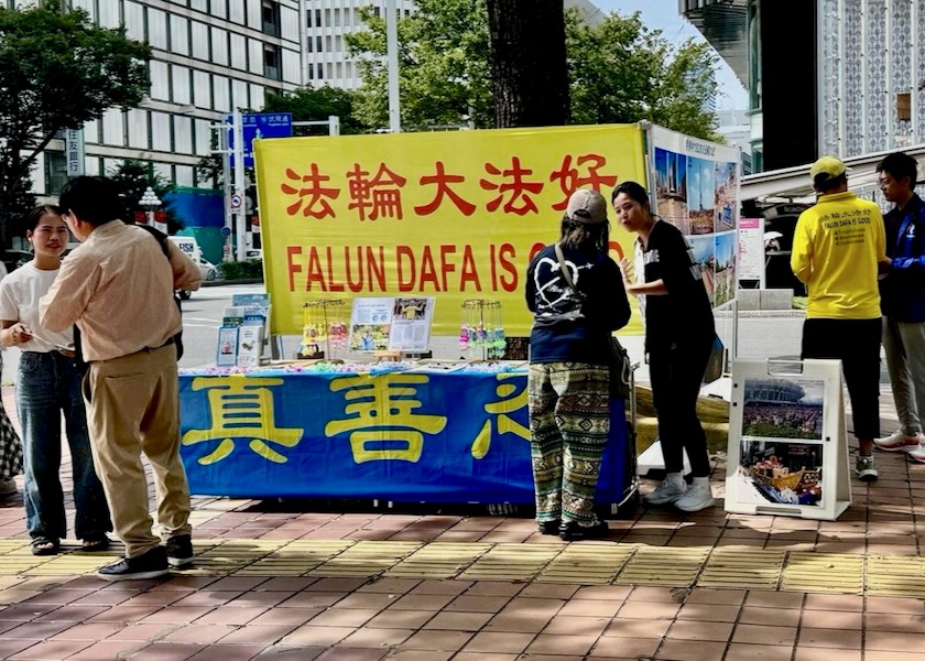 Image for article Japón: Los practicantes informan a la gente en los Juegos Asiáticos sobre la persecución en China
